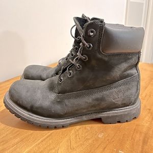Women’s black Timberland work boots.